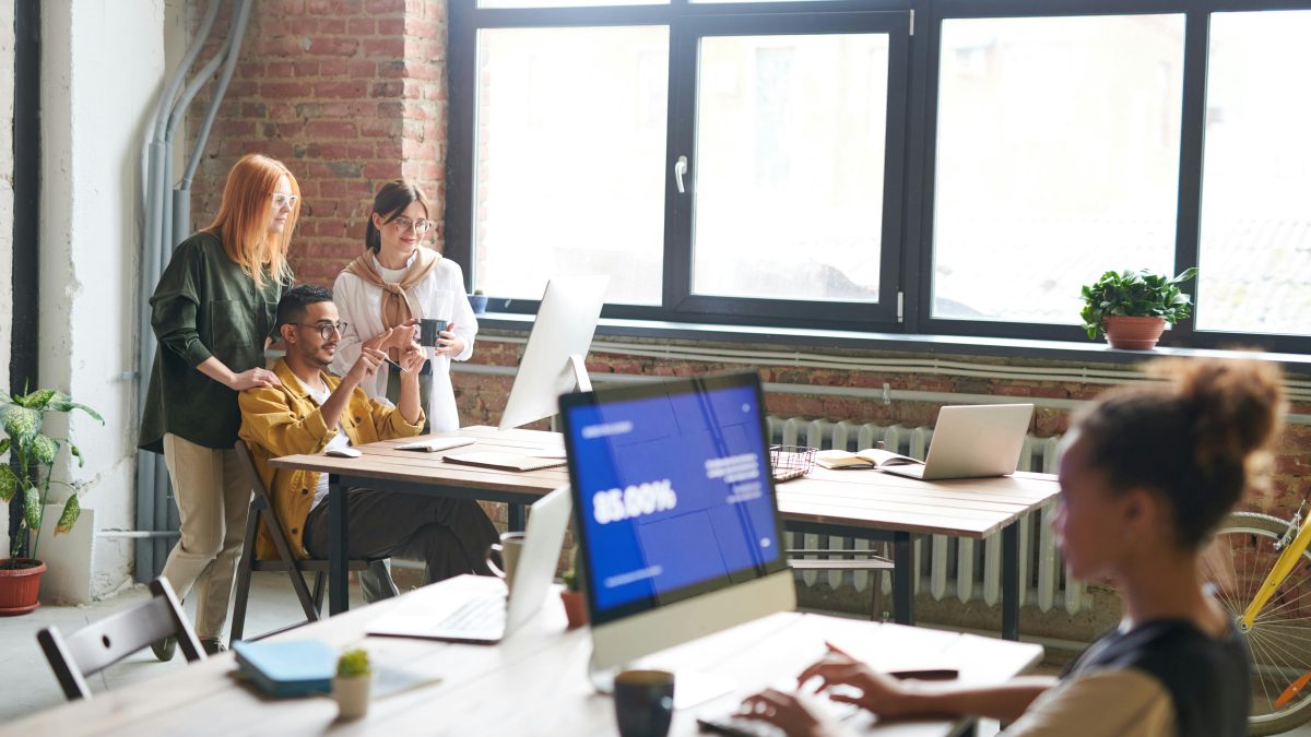 Staff in a busy tech office